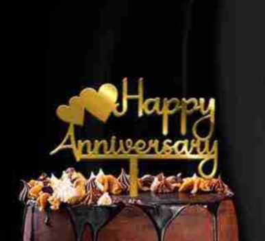 Happy anniversary cake topper. 